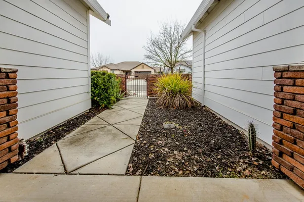 a view of a back yard of the house