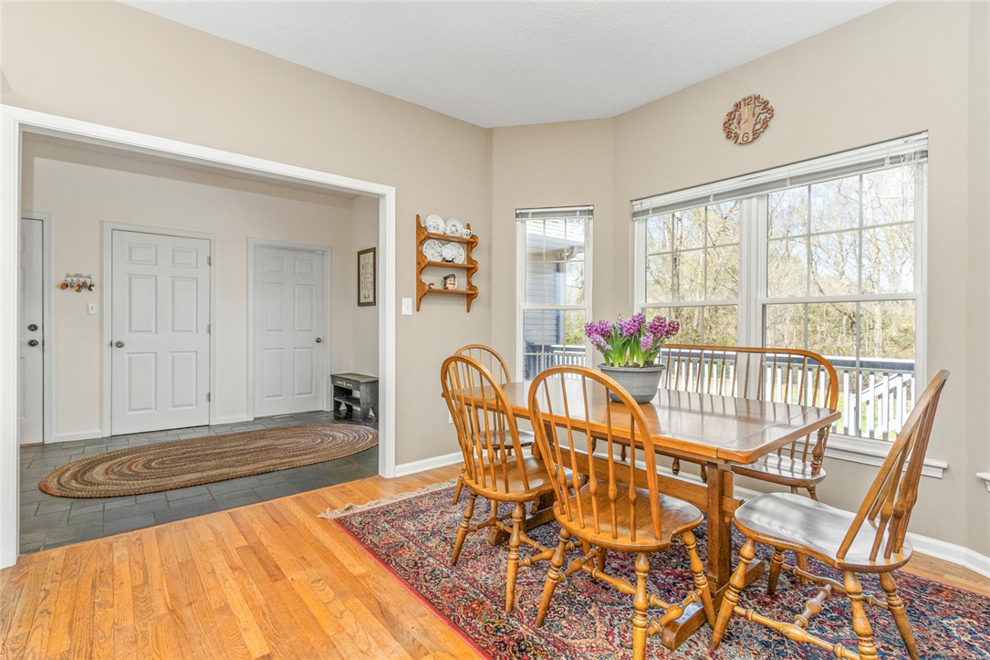 108 Pearman Drive Pendleton, SC 29670 - Photo 13 of 50 This bright dining area boasts large windows and rich hardwood floors.
