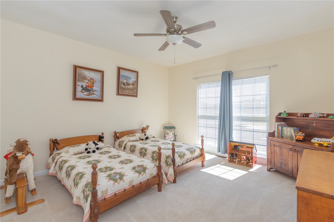 108 Pearman Drive Pendleton, SC 29670 - Photo 18 of 50 This spacious bedroom offers ample natural light and a comfortable atmosphere for rest and relaxation.