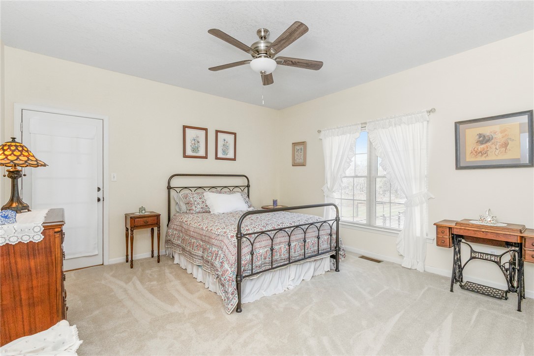108 Pearman Drive Pendleton, SC 29670 - Photo 22 of 50 This tranquil bedroom offers comfort and a bright atmosphere for relaxation.