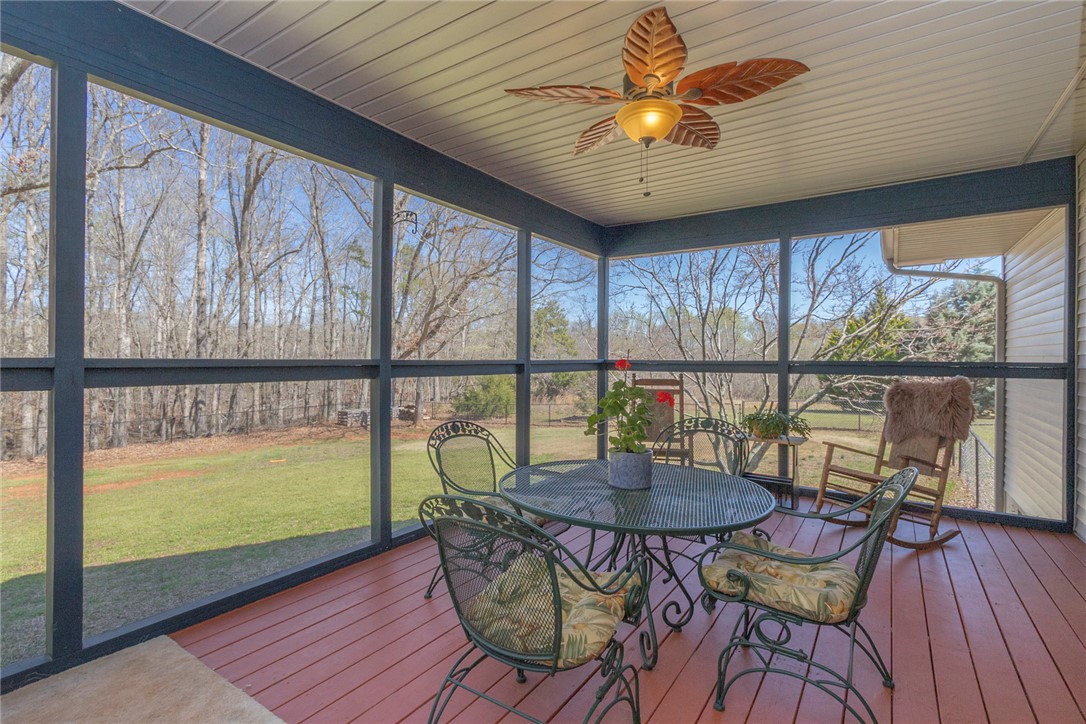 108 Pearman Drive Pendleton, SC 29670 - Photo 42 of 50 This inviting screened porch provides a serene connection to the surrounding nature.