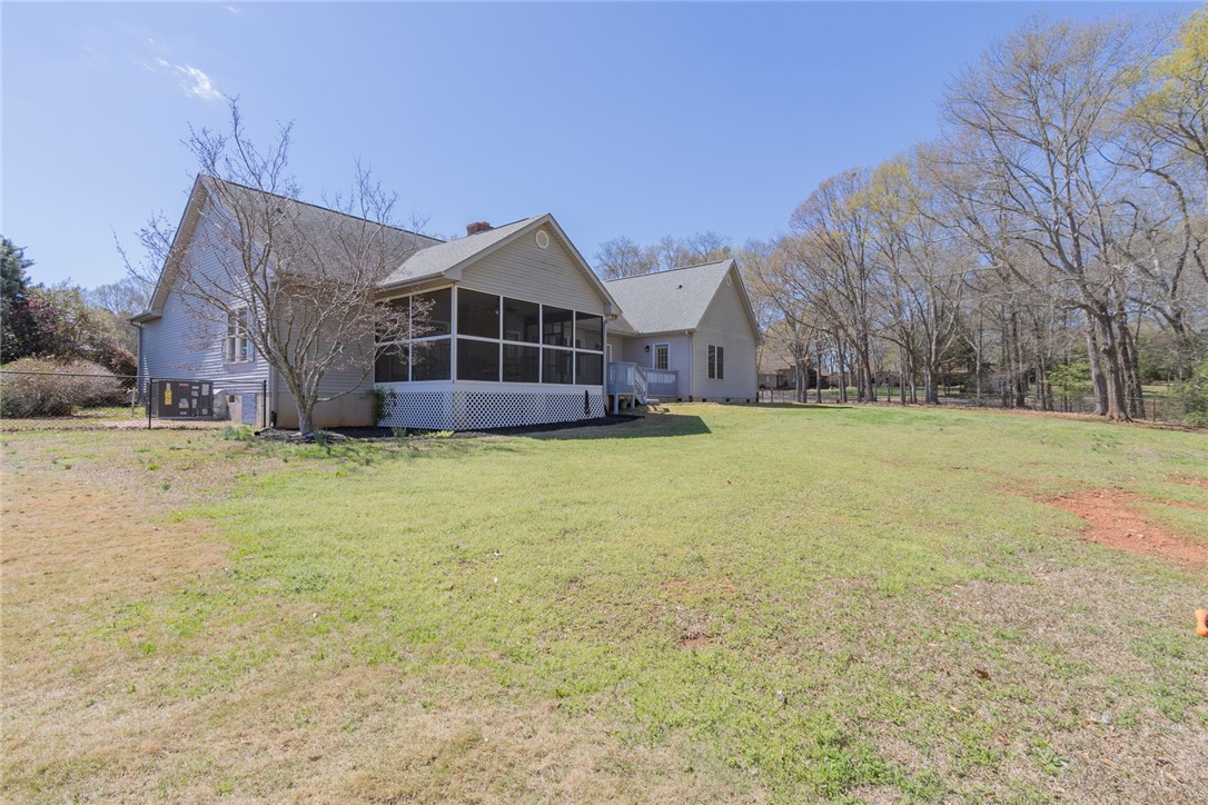 108 Pearman Drive Pendleton, SC 29670 - Photo 47 of 50 This expansive backyard offers ample space for recreation and outdoor enjoyment.
