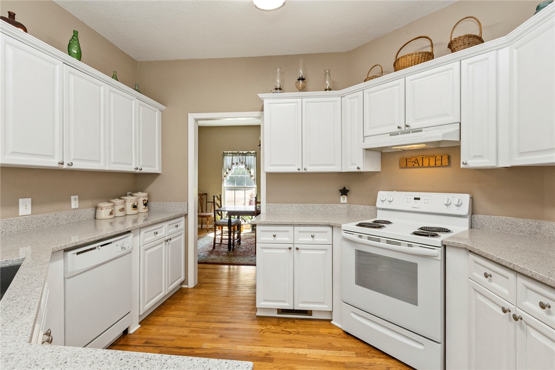 108 Pearman Drive Pendleton, SC 29670 - Photo 10 of 50 This spacious kitchen offers ample storage and a clear view into the adjacent dining area.