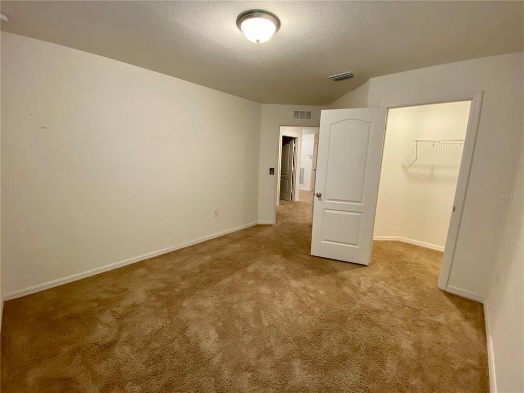 8659 Silverbell Loop Brooksville, FL 34613 - Photo 29 of 36 a view of an empty room