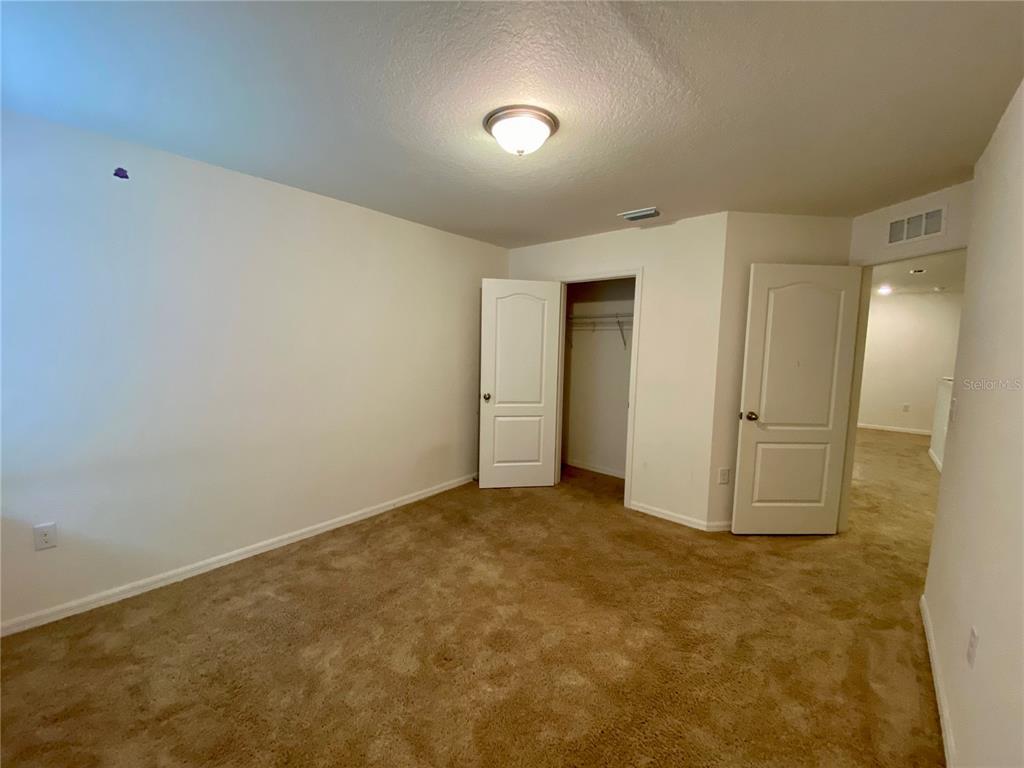 8659 Silverbell Loop Brooksville, FL 34613 - Photo 32 of 36 a view of an empty room
