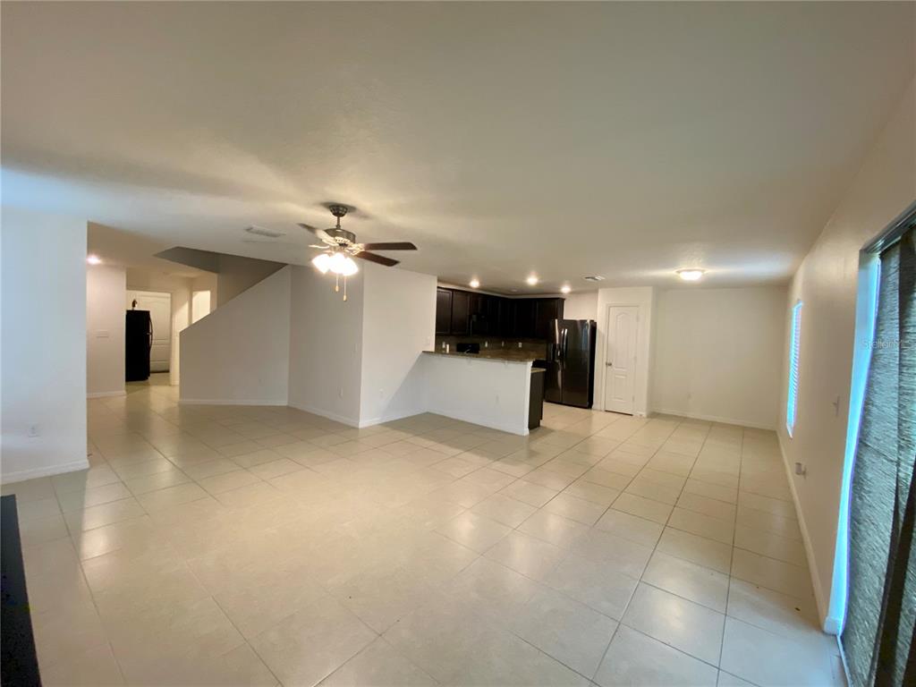 8659 Silverbell Loop Brooksville, FL 34613 - Photo 7 of 36 a view of a livingroom with a furniture