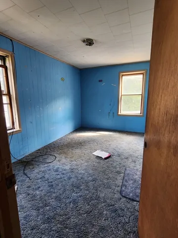 a view of a room with a window