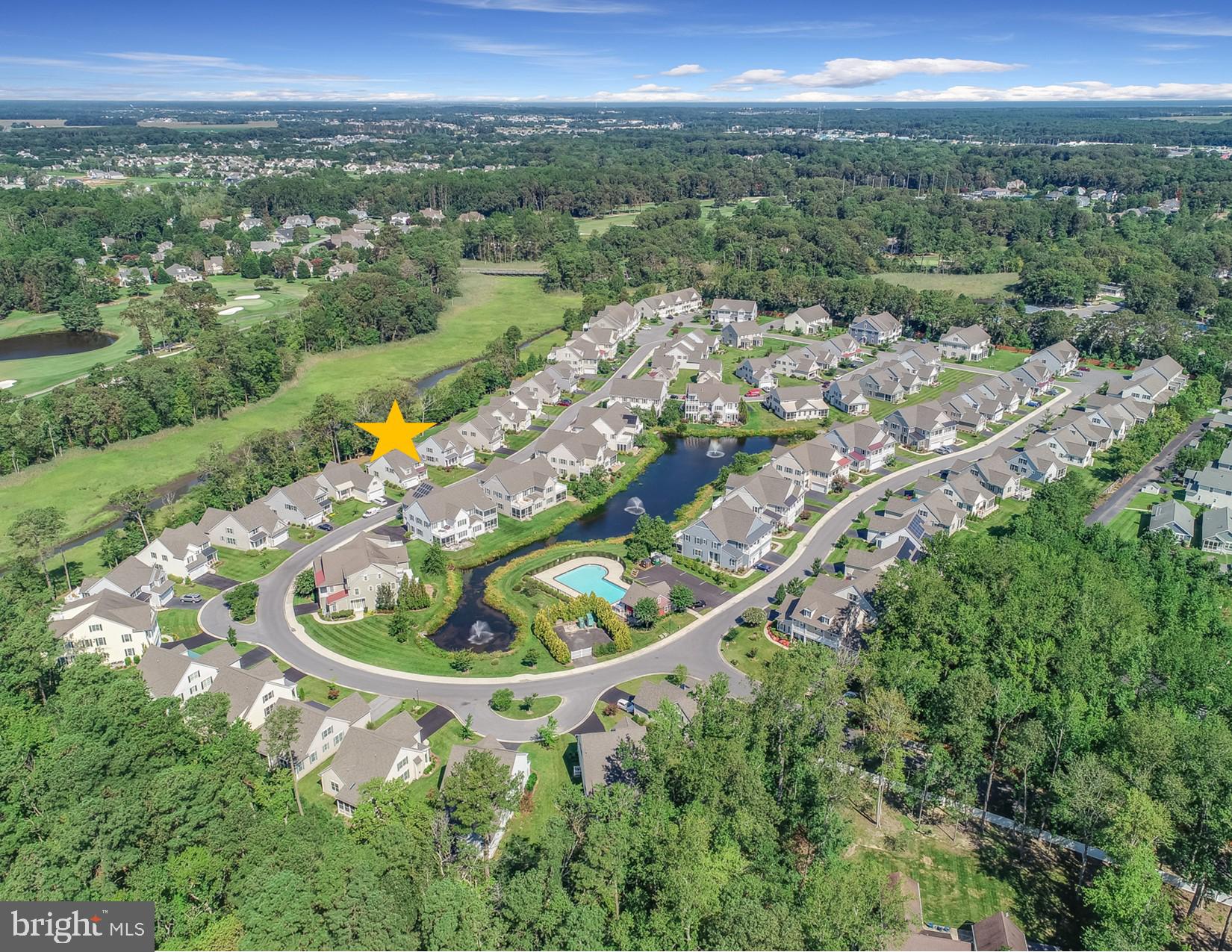 36490 Warwick Drive, Unit 14 Rehoboth Beach, DE 19971 - Photo 1 of 42 Welcome to the Seasons - backs to Johnsons Branch