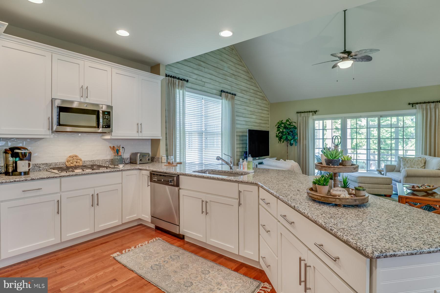 36490 Warwick Drive, Unit 14 Rehoboth Beach, DE 19971 - Photo 17 of 42 Kitchen with granite counters