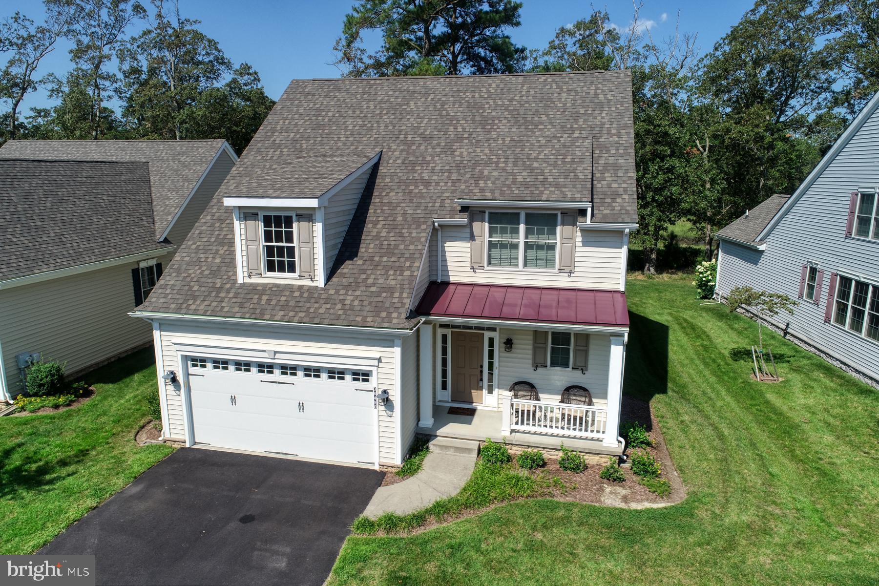 36490 Warwick Drive, Unit 14 Rehoboth Beach, DE 19971 - Photo 3 of 42 Welcoming front porch and two car garage