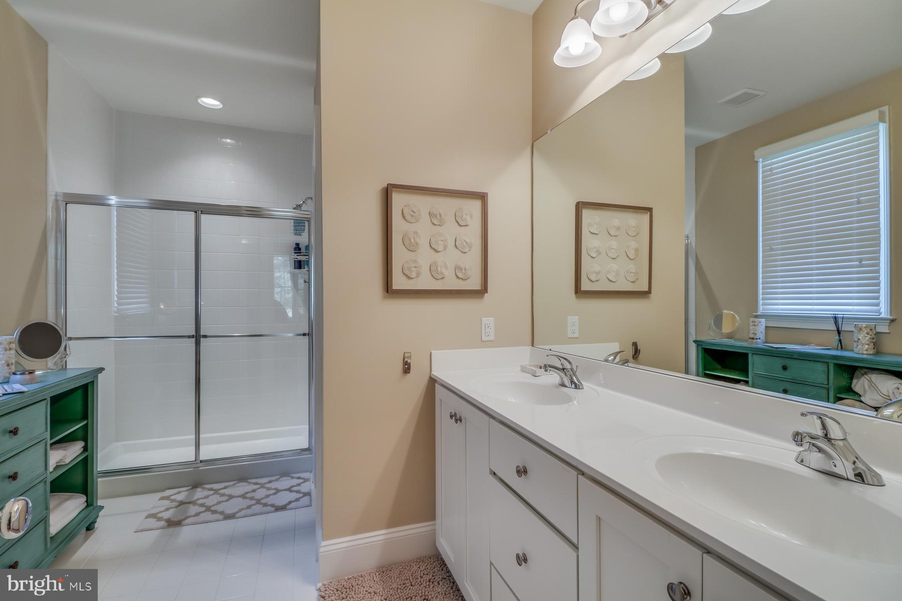 36490 Warwick Drive, Unit 14 Rehoboth Beach, DE 19971 - Photo 22 of 42 First level owners bathroom