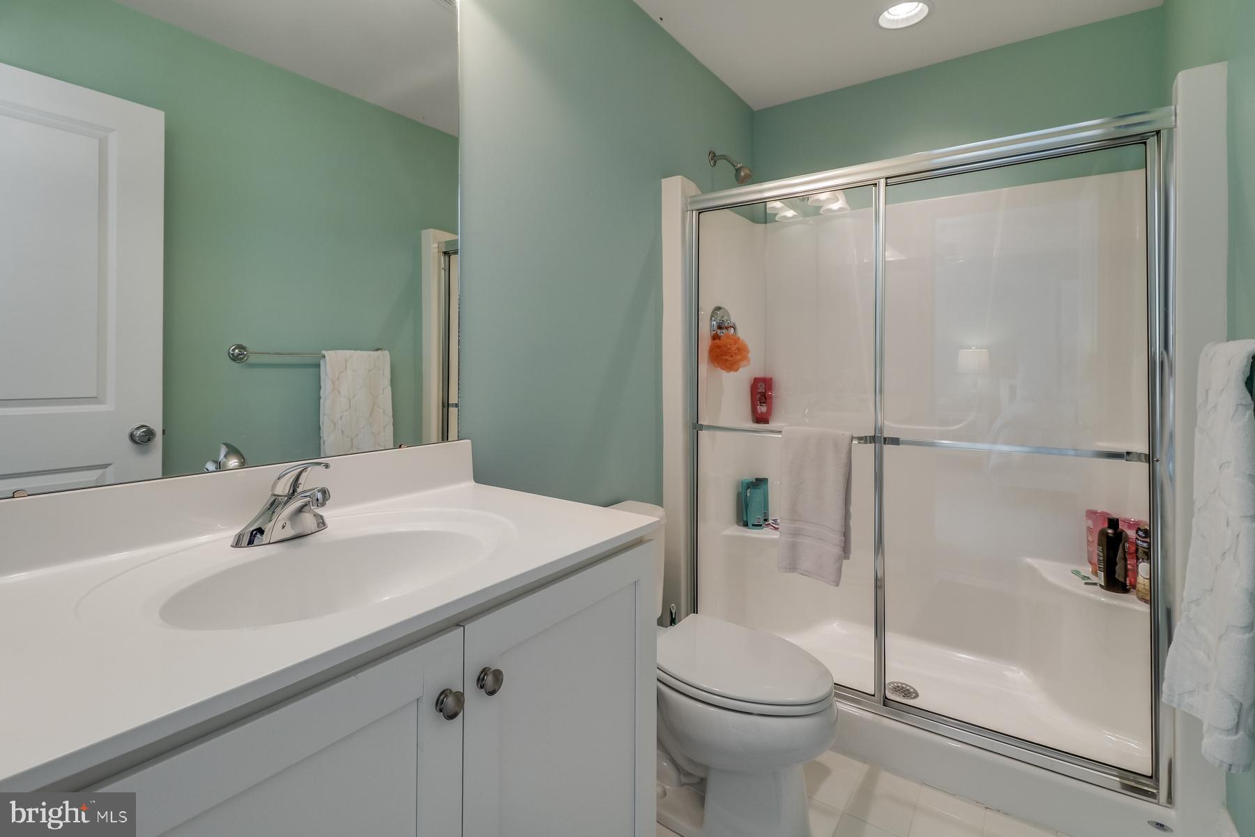 36490 Warwick Drive, Unit 14 Rehoboth Beach, DE 19971 - Photo 33 of 42 Second level master bathroom