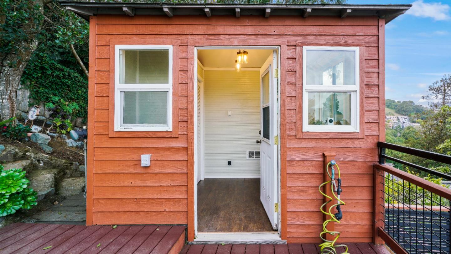 338 Kings Road Brisbane, CA 94005 - Photo 13 of 53 a front view of a house with a yard