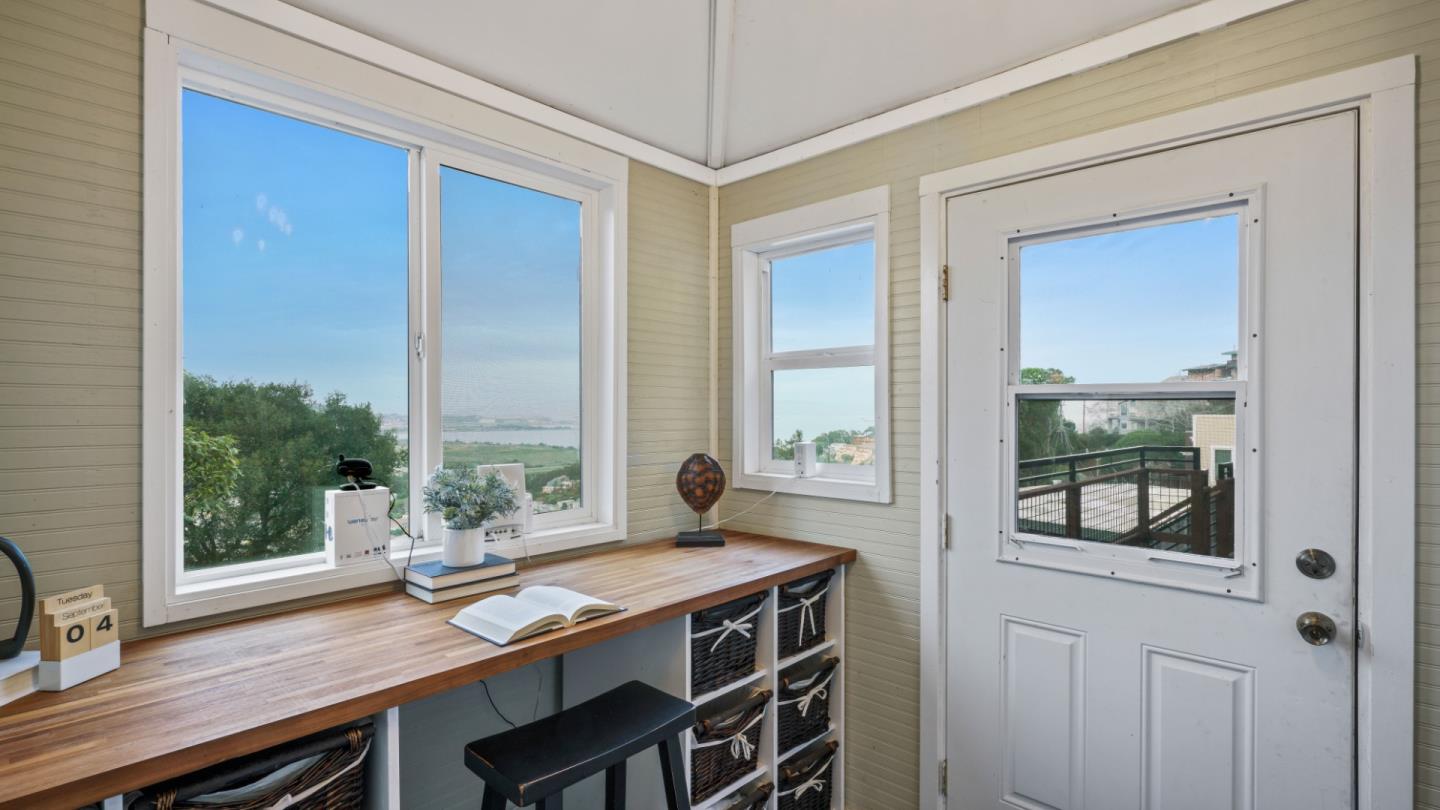 338 Kings Road Brisbane, CA 94005 - Photo 19 of 53 a view of a kitchen area with furniture and window