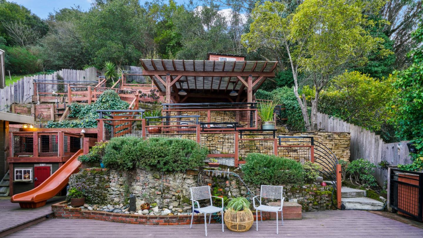 338 Kings Road Brisbane, CA 94005 - Photo 24 of 53 a view of a chair and tables in the patio