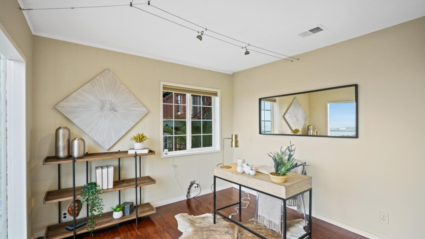 338 Kings Road Brisbane, CA 94005 - Photo 35 of 53 a view of a workspace with furniture window and wooden floor