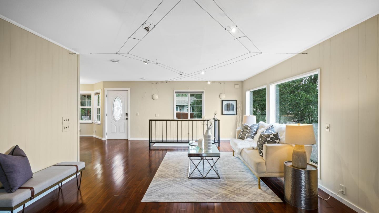 338 Kings Road Brisbane, CA 94005 - Photo 43 of 53 a living room with furniture rug and wooden floor