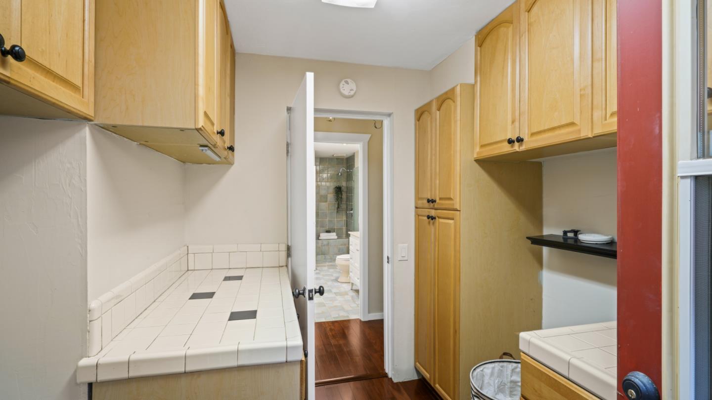 338 Kings Road Brisbane, CA 94005 - Photo 47 of 53 a bathroom with a sink a toilet and shower