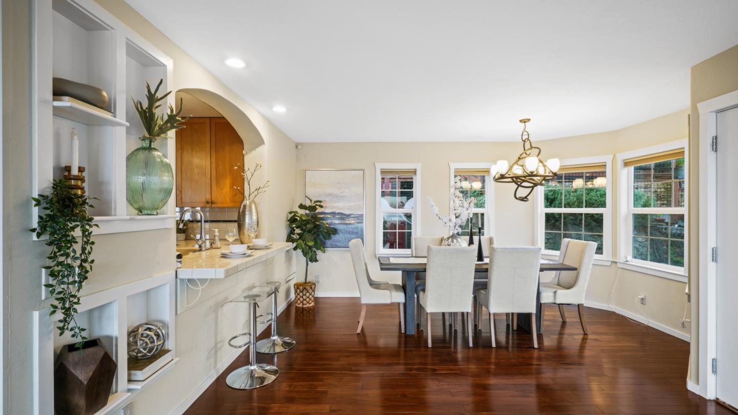 338 Kings Road Brisbane, CA 94005 - Photo 5 of 53 a view of a dining room with furniture window and wooden floor