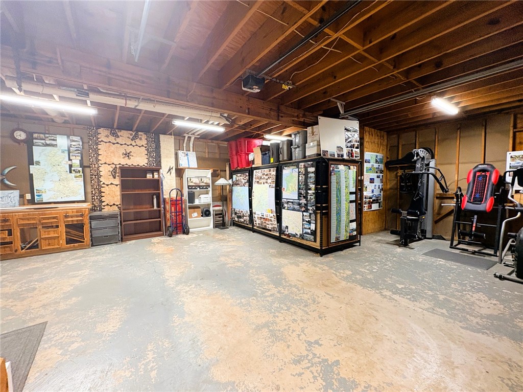 10794 Farm To Market 2159 Calvert, TX 77837 - Photo 27 of 46 Cabin - garage with garage door/storage