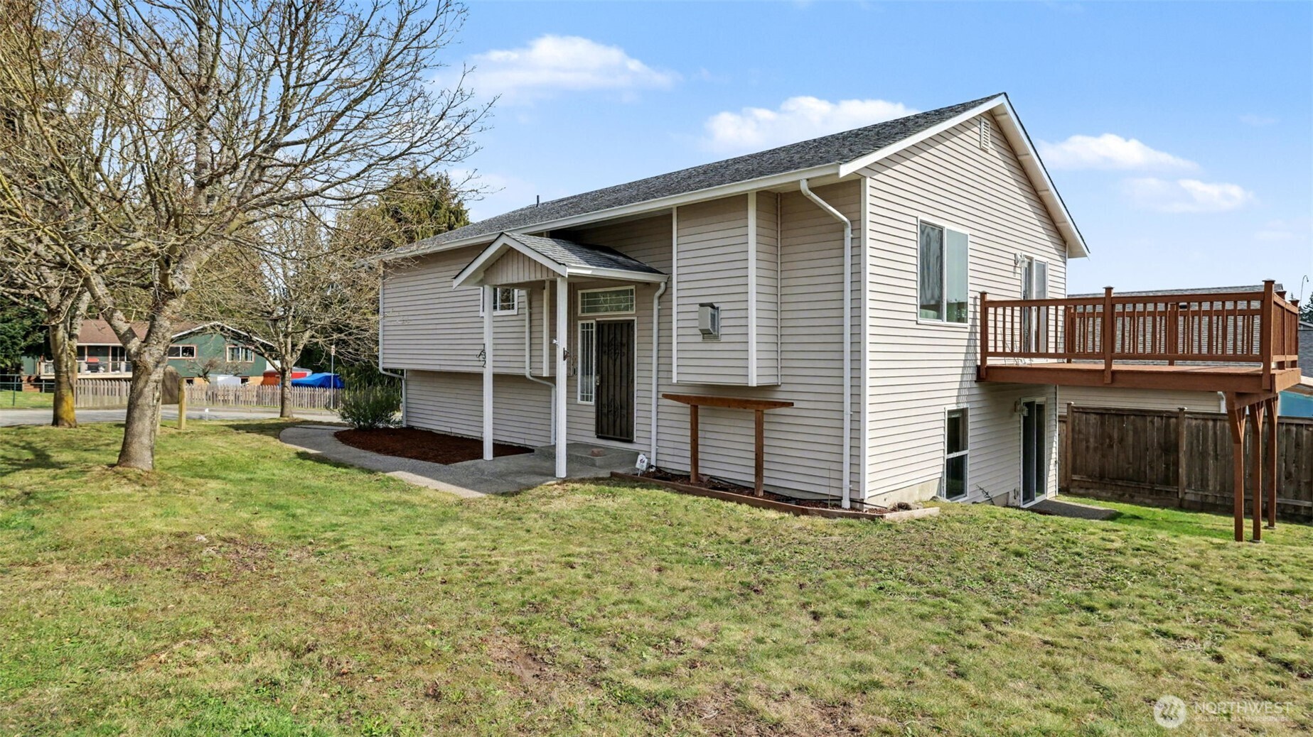 132 76th Place Southwest Everett, WA 98203 - Photo 1 of 36 a view of a house with a yard and fence