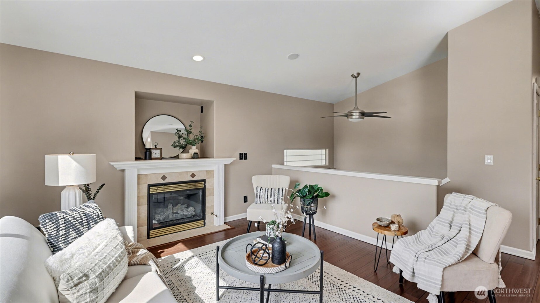 132 76th Place Southwest Everett, WA 98203 - Photo 11 of 36 a living room with furniture a rug and a fireplace