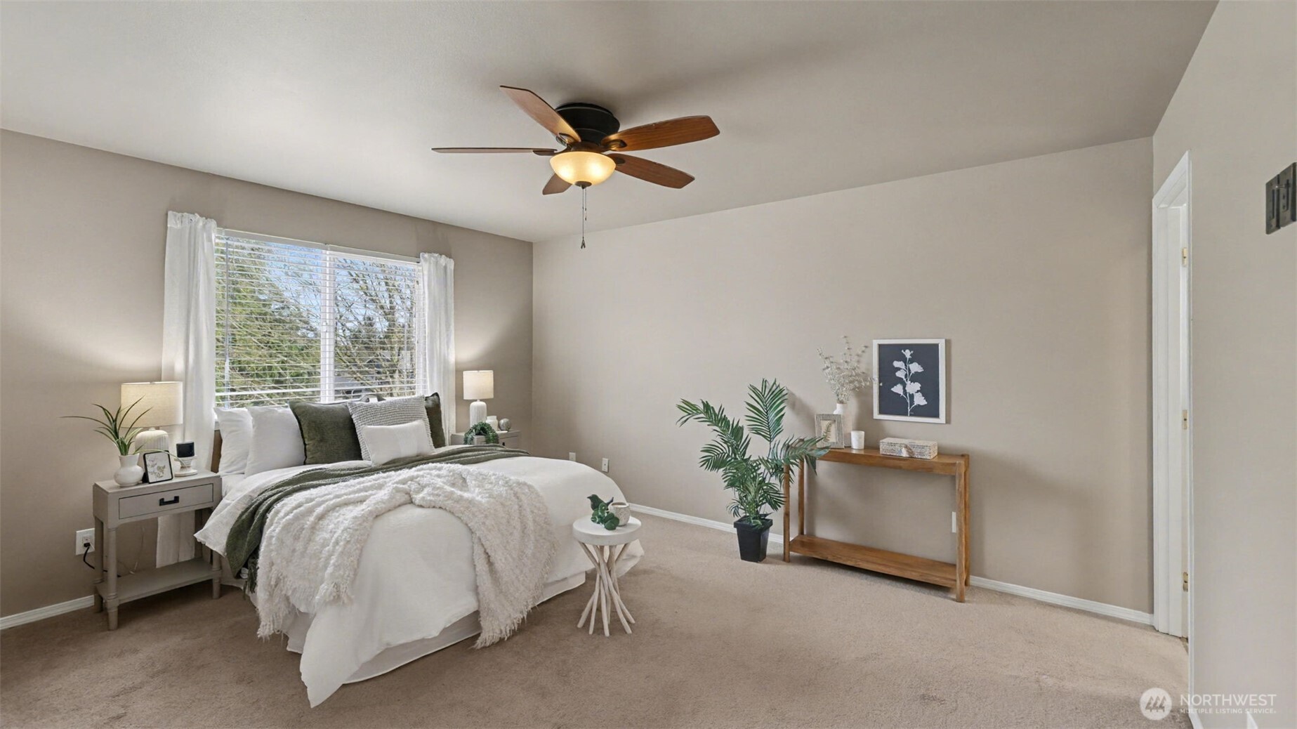 132 76th Place Southwest Everett, WA 98203 - Photo 19 of 36 a bedroom with a bed and a chandelier