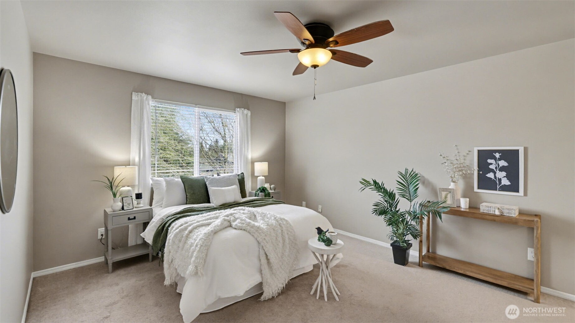 132 76th Place Southwest Everett, WA 98203 - Photo 20 of 36 a bed sitting in a bedroom next to a window