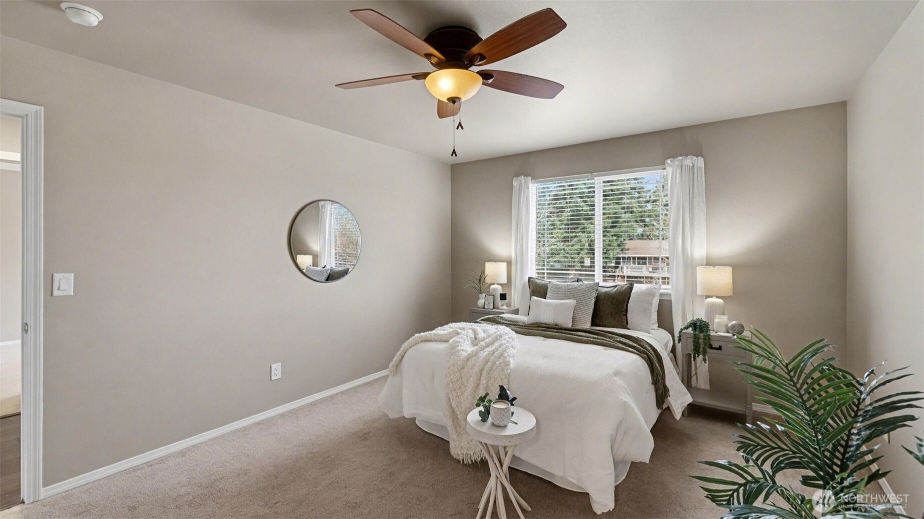 132 76th Place Southwest Everett, WA 98203 - Photo 21 of 36 a bedroom with a bed and a chandelier