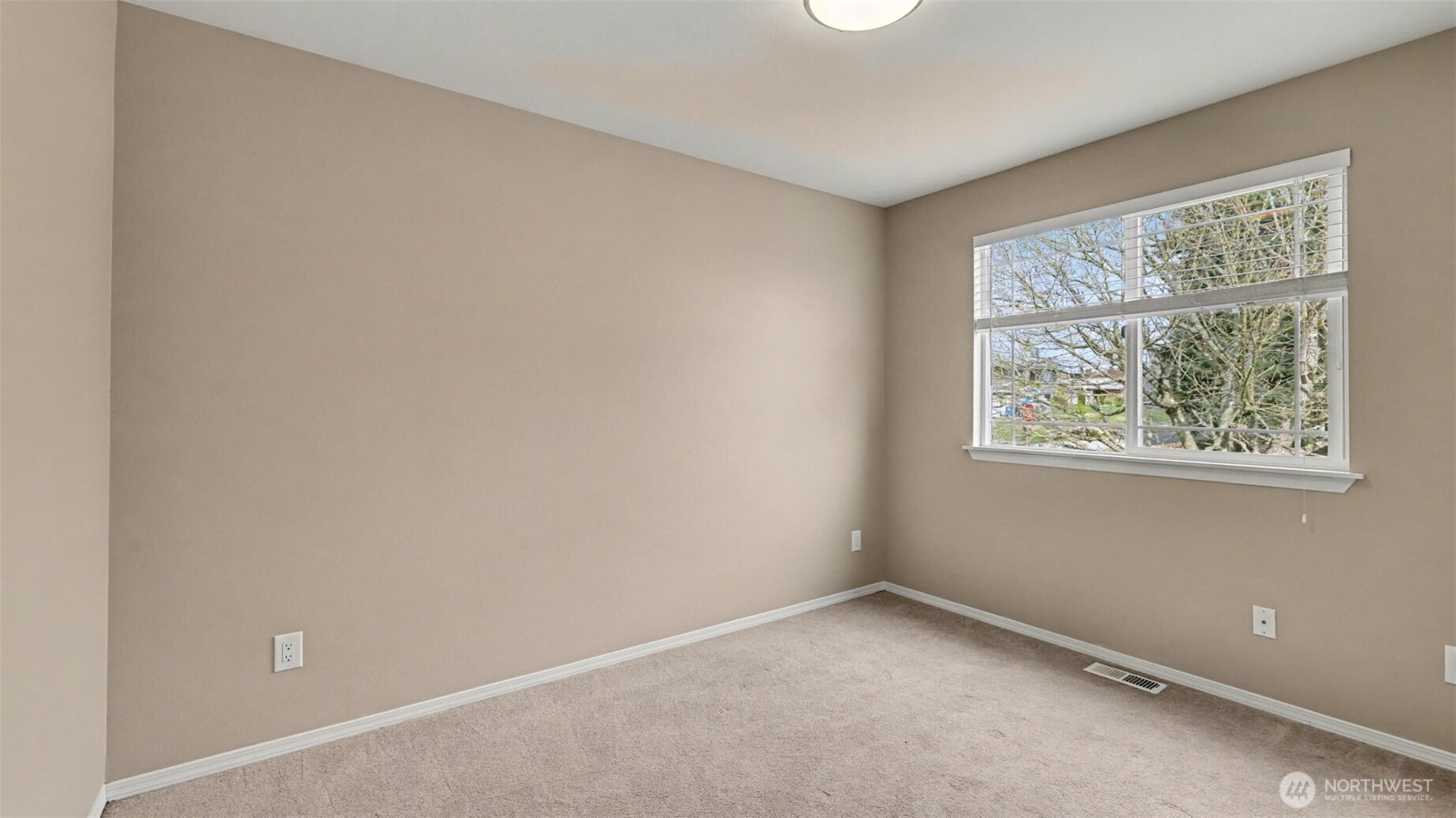 132 76th Place Southwest Everett, WA 98203 - Photo 24 of 36 an empty room with a window