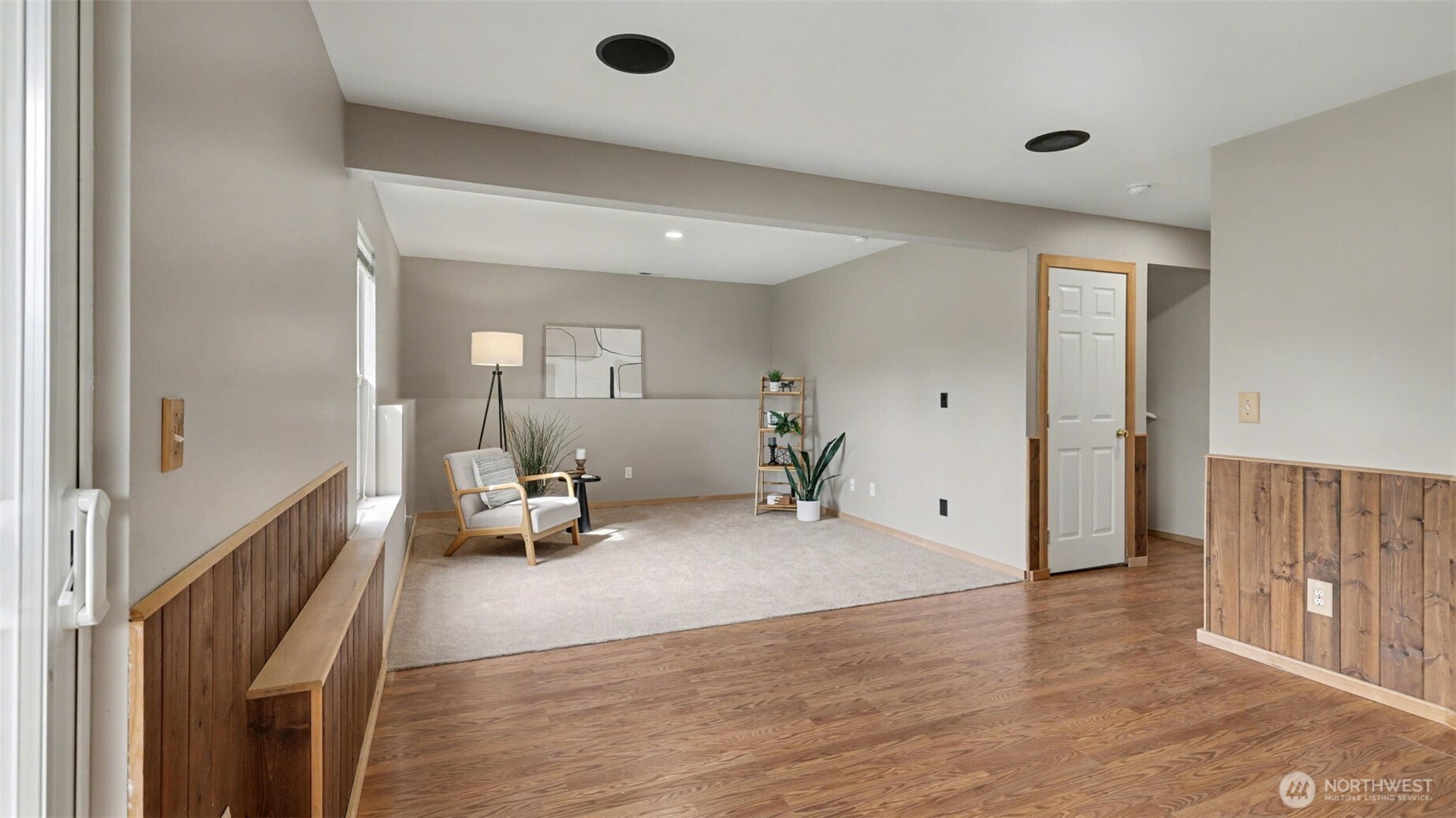 132 76th Place Southwest Everett, WA 98203 - Photo 28 of 36 a very nice looking room with wooden floor and furniture
