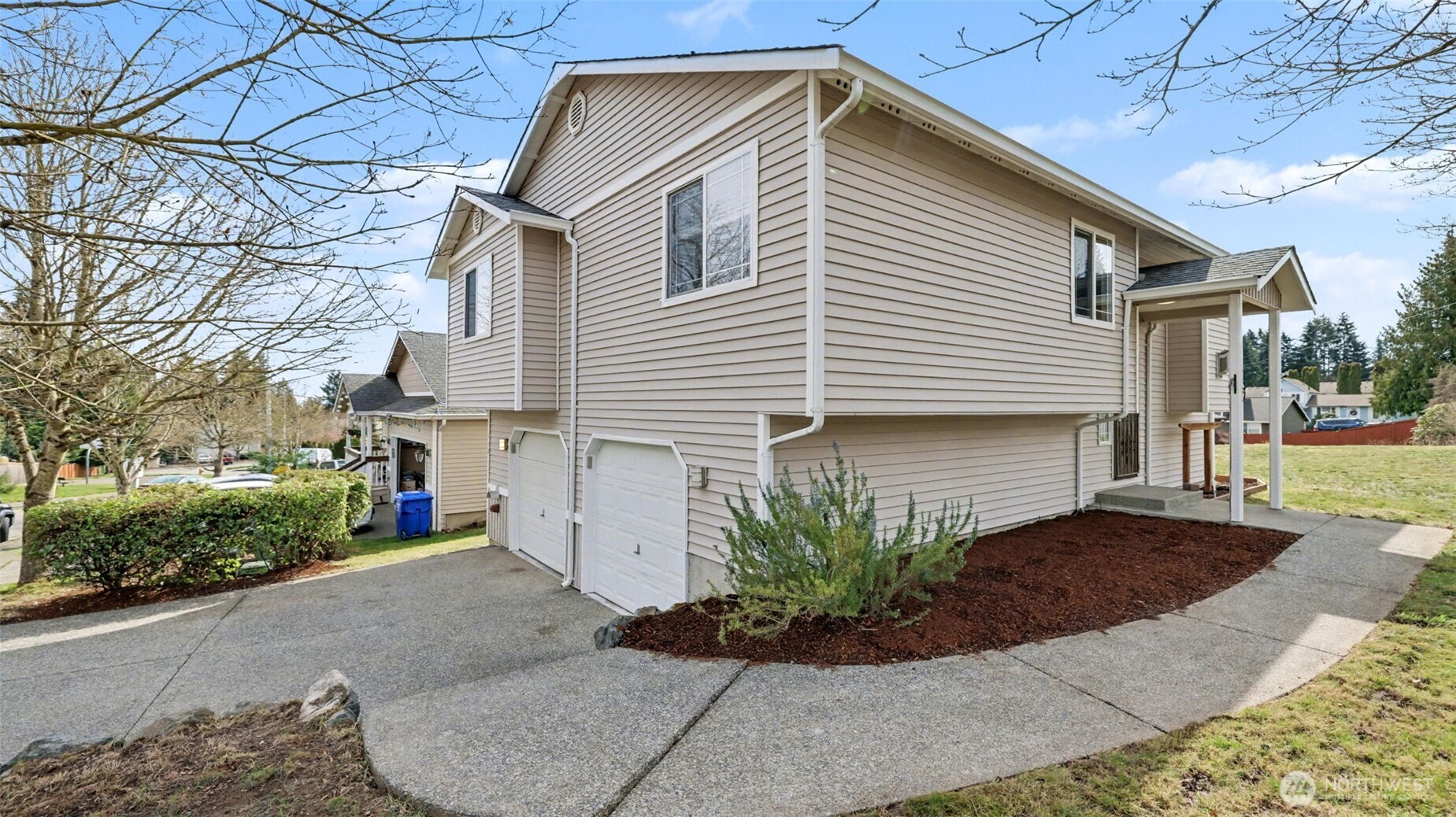 132 76th Place Southwest Everett, WA 98203 - Photo 6 of 36 a view of a house with a yard