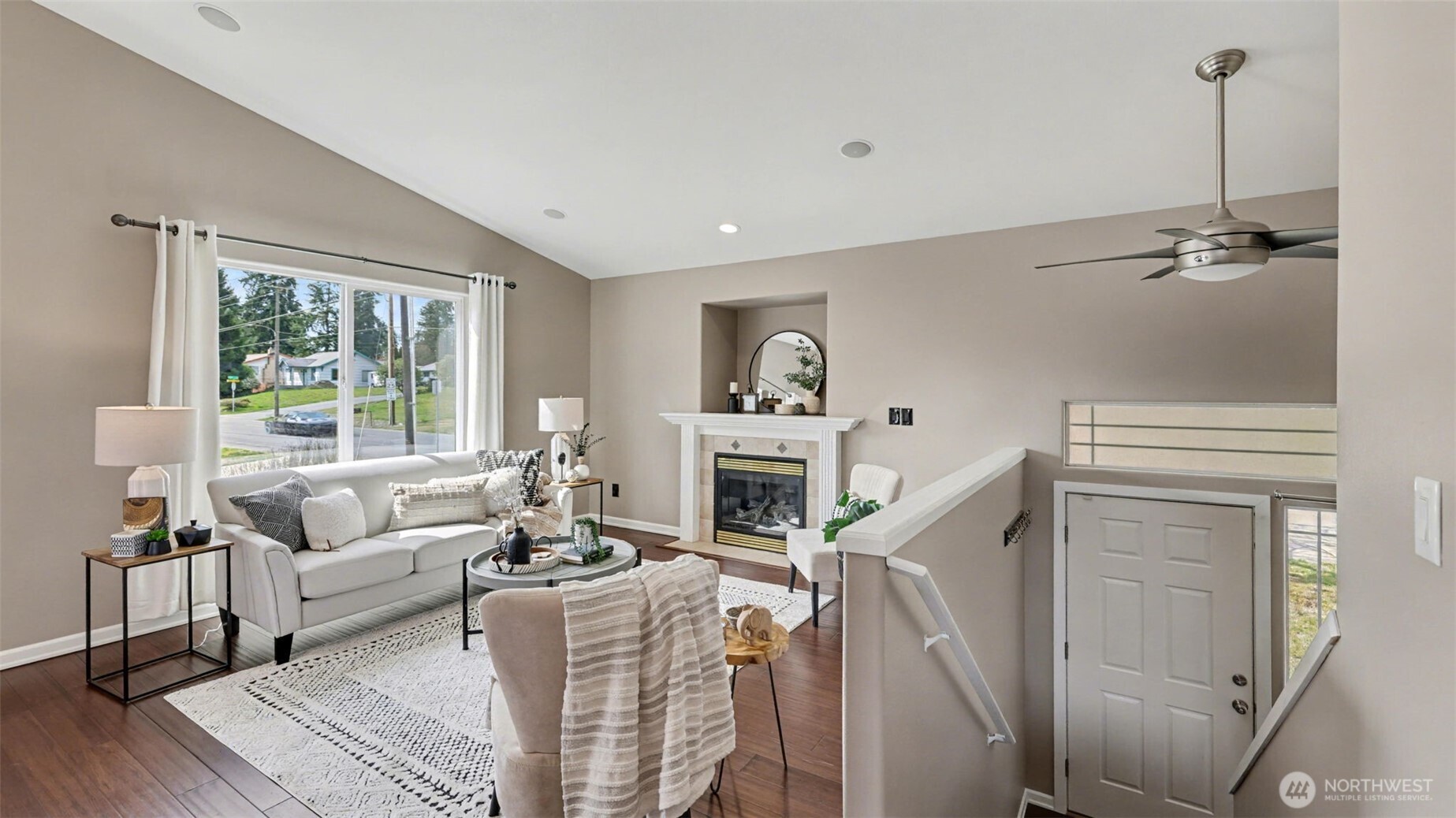 132 76th Place Southwest Everett, WA 98203 - Photo 7 of 36 a living room with furniture and a fireplace