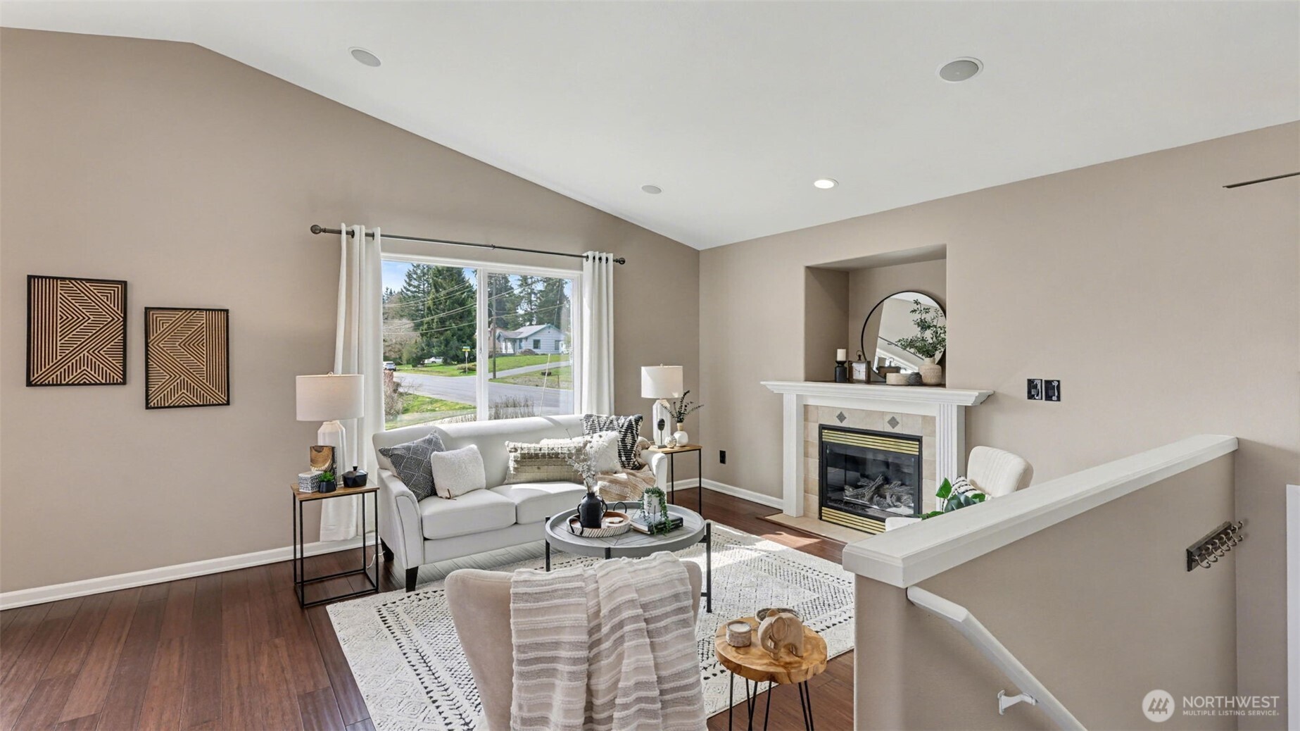 132 76th Place Southwest Everett, WA 98203 - Photo 8 of 36 a living room with furniture and a fireplace