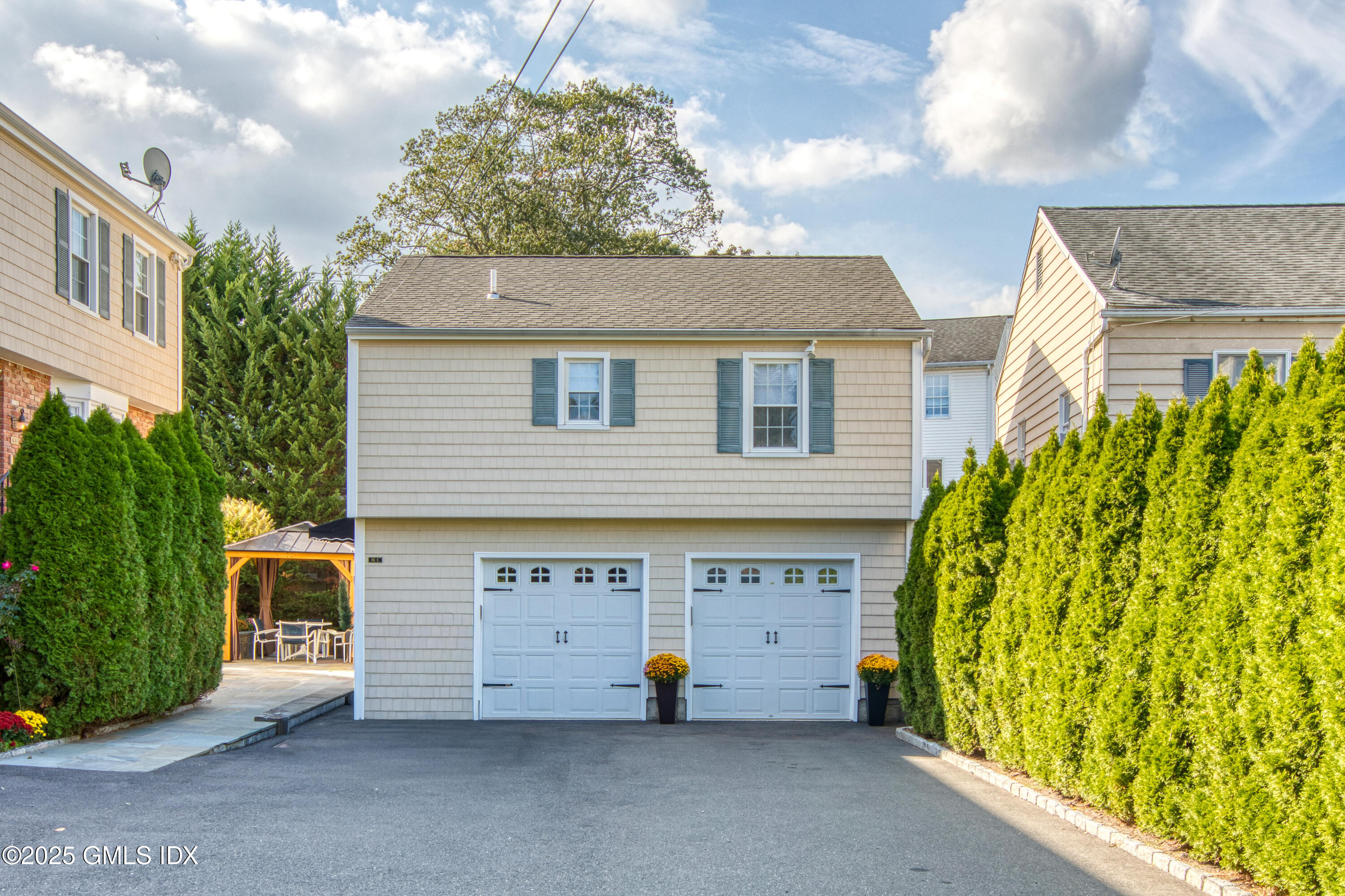 66 Ute Place, Unit C Greenwich, CT 06830 - Photo 1 of 18 a view of outdoor space and front view of a house