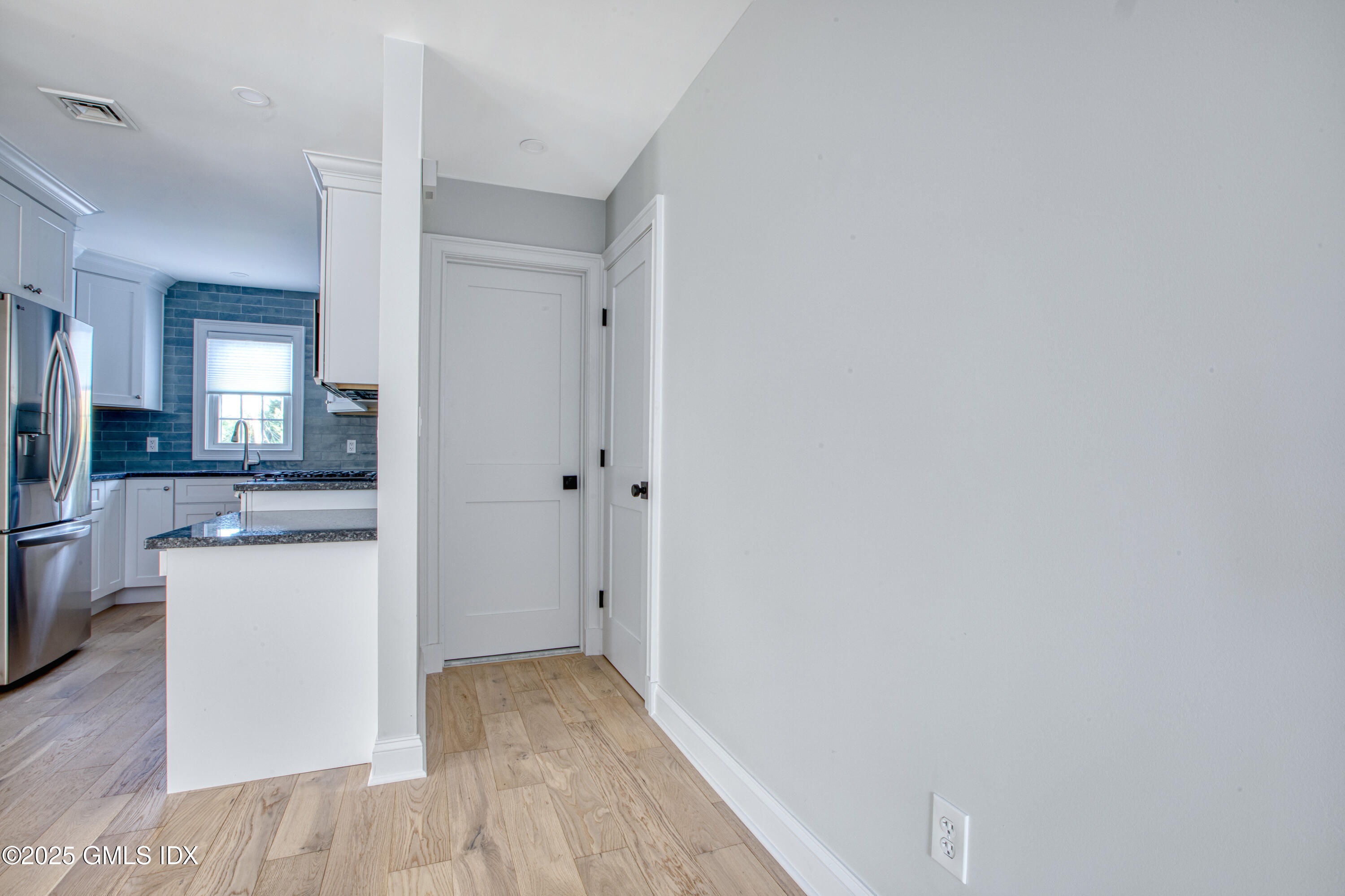 66 Ute Place, Unit C Greenwich, CT 06830 - Photo 8 of 18 a view of a kitchen cabinets and wooden floor