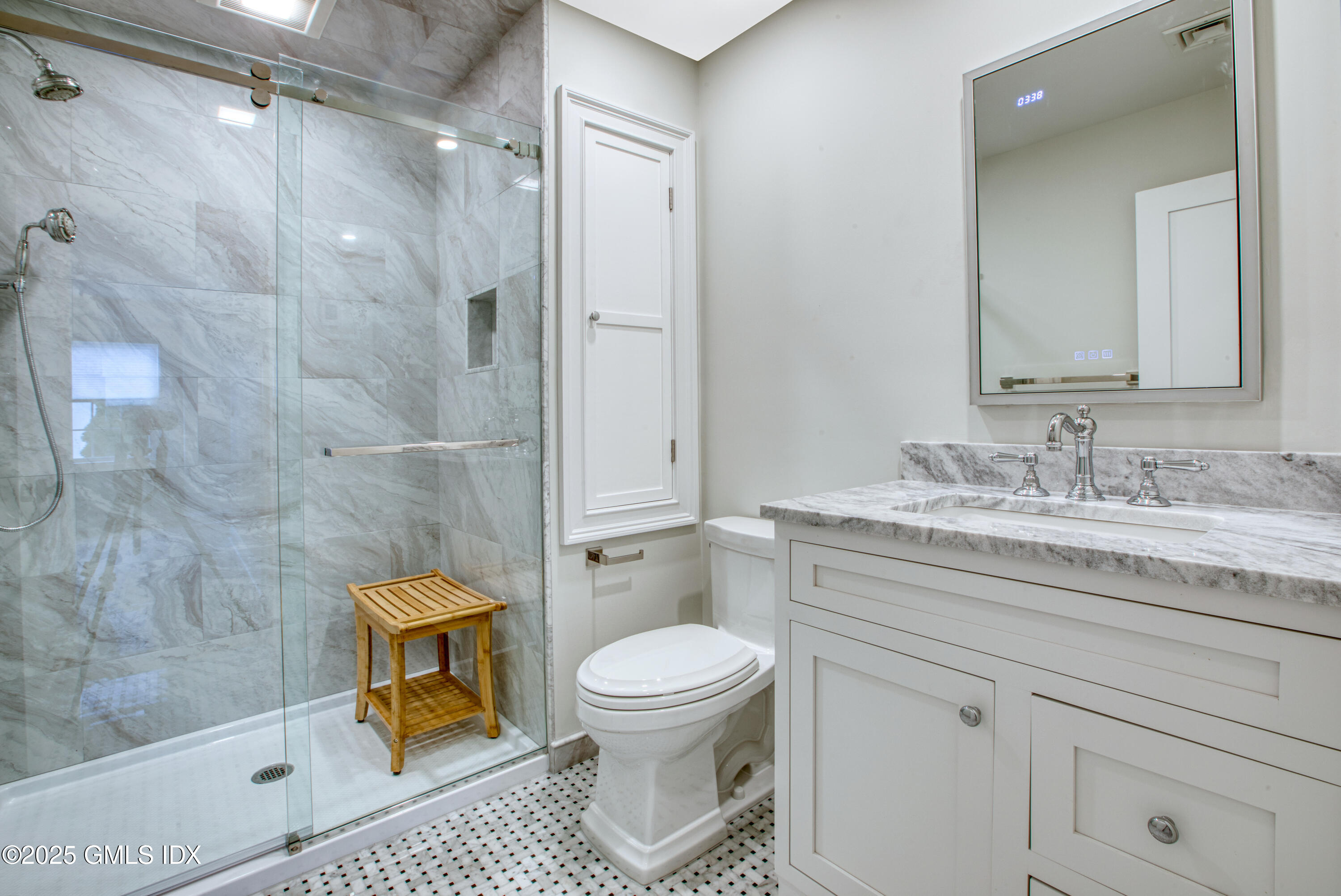 66 Ute Place, Unit C Greenwich, CT 06830 - Photo 9 of 18 a bathroom with a granite countertop sink toilet and shower