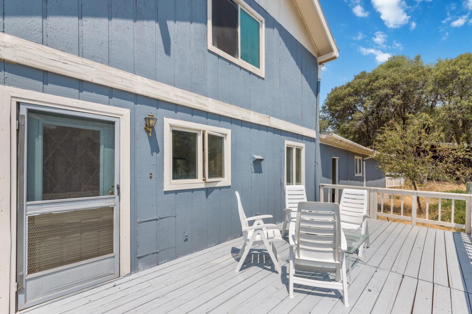 40707 Jean Road East Oakhurst, CA 93644 - Photo 16 of 44 a view of deck with patio
