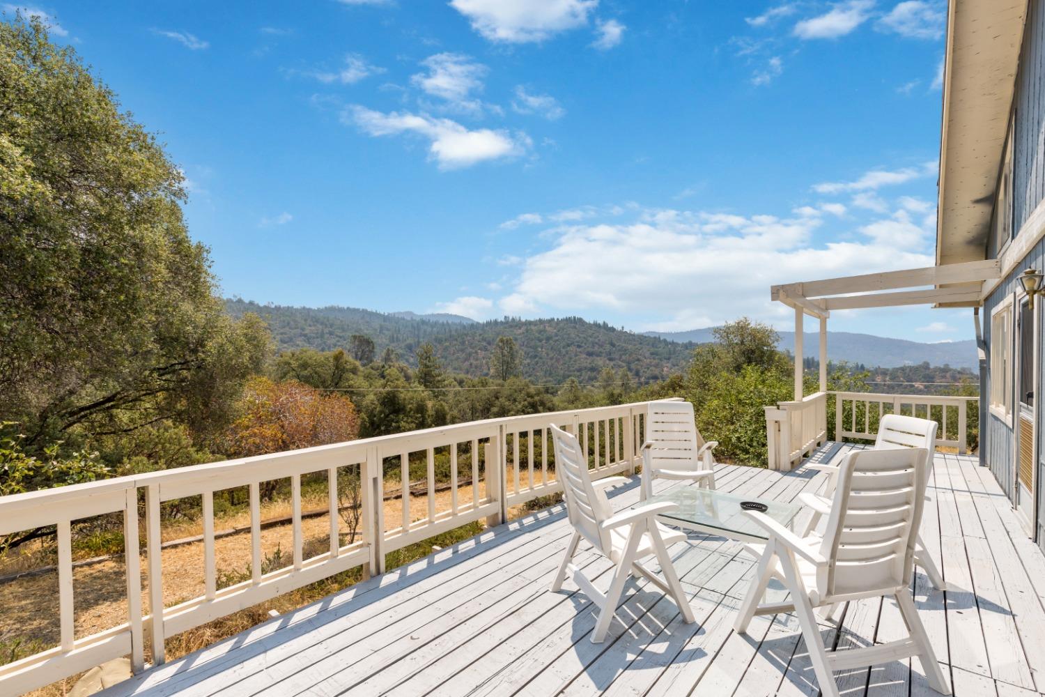 40707 Jean Road East Oakhurst, CA 93644 - Photo 17 of 44 a view of a balcony with a patio