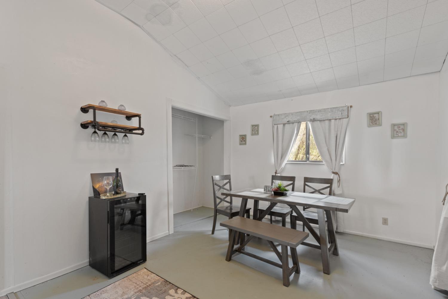 40707 Jean Road East Oakhurst, CA 93644 - Photo 30 of 44 a workspace room with furniture and a window
