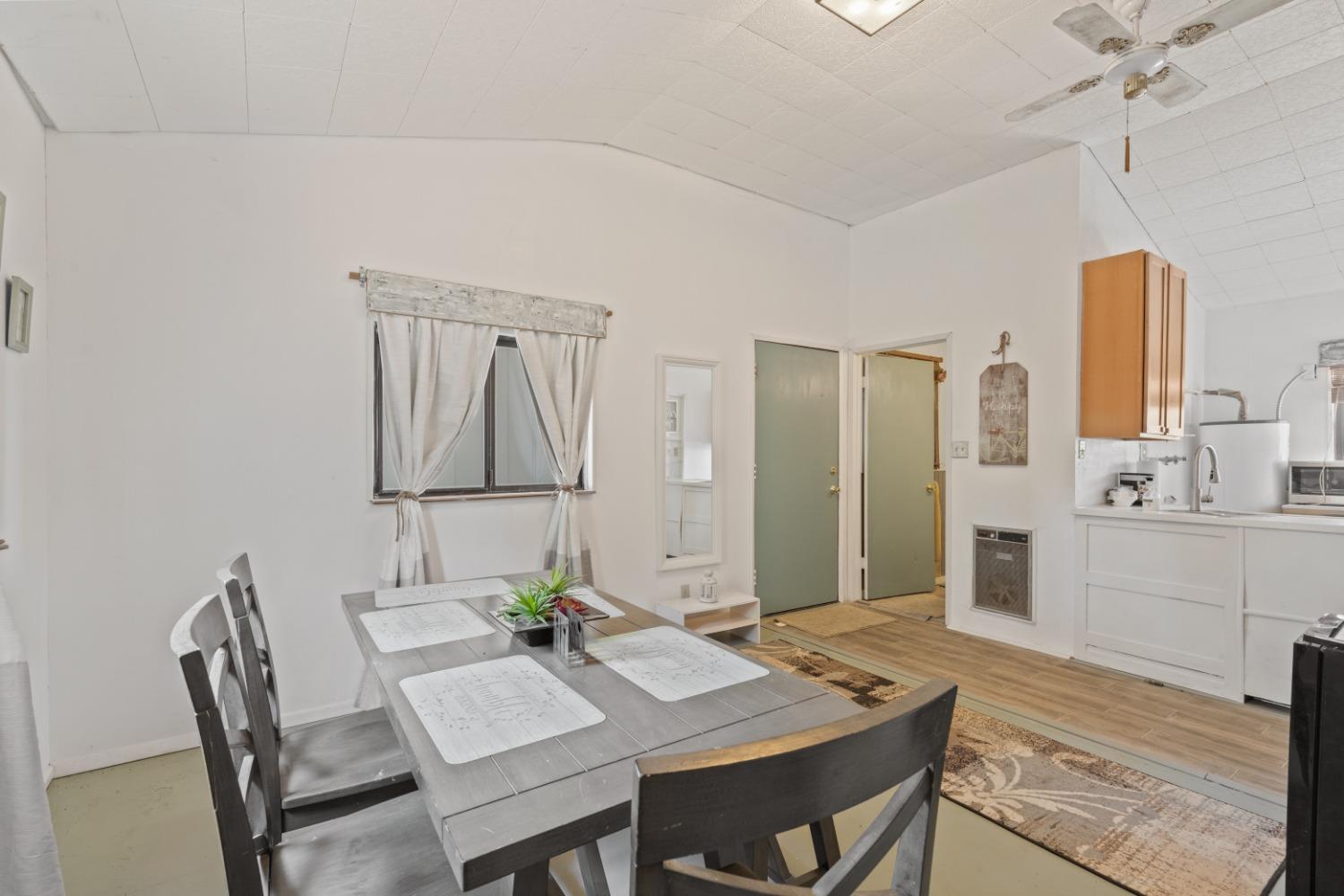 40707 Jean Road East Oakhurst, CA 93644 - Photo 31 of 44 a view of a dining room with furniture