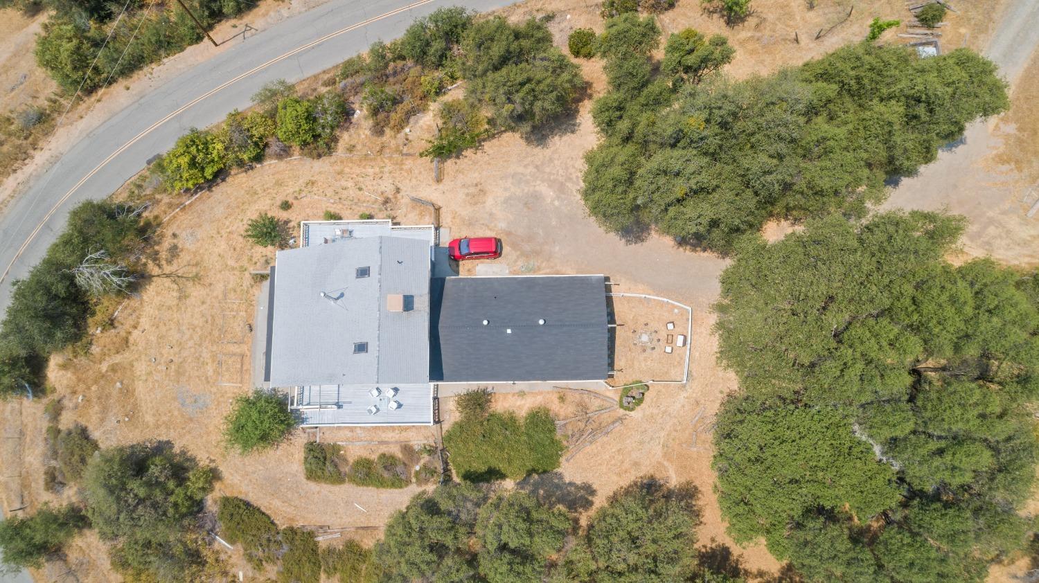 40707 Jean Road East Oakhurst, CA 93644 - Photo 40 of 44 an aerial view of a house