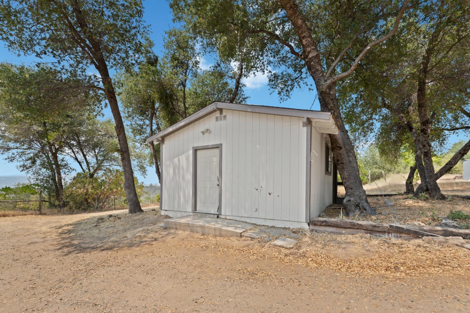 40707 Jean Road East Oakhurst, CA 93644 - Photo 41 of 44 a view of a house with a outdoor space