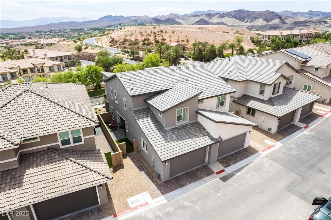 128 Kimberlite Drive Henderson, NV 89011 - Photo 33 of 55 Aerial view of residential area with mountains