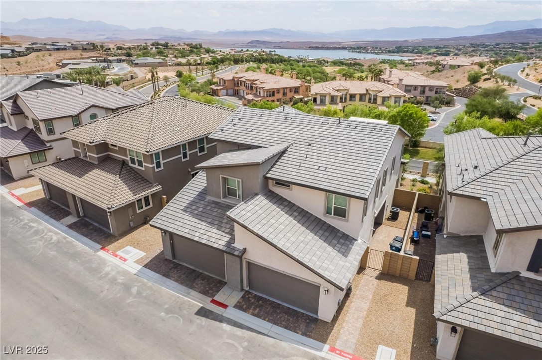 128 Kimberlite Drive Henderson, NV 89011 - Photo 35 of 55 Aerial perspective of suburban area featuring a water and mountain view