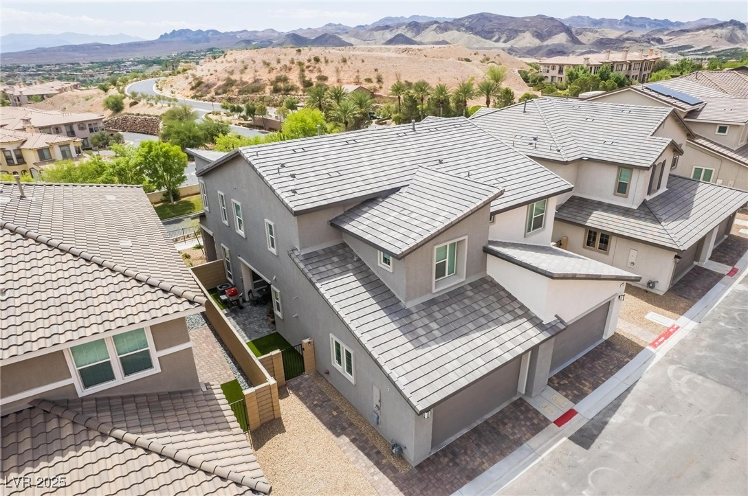 128 Kimberlite Drive Henderson, NV 89011 - Photo 38 of 55 Aerial view of residential area with a mountain backdrop