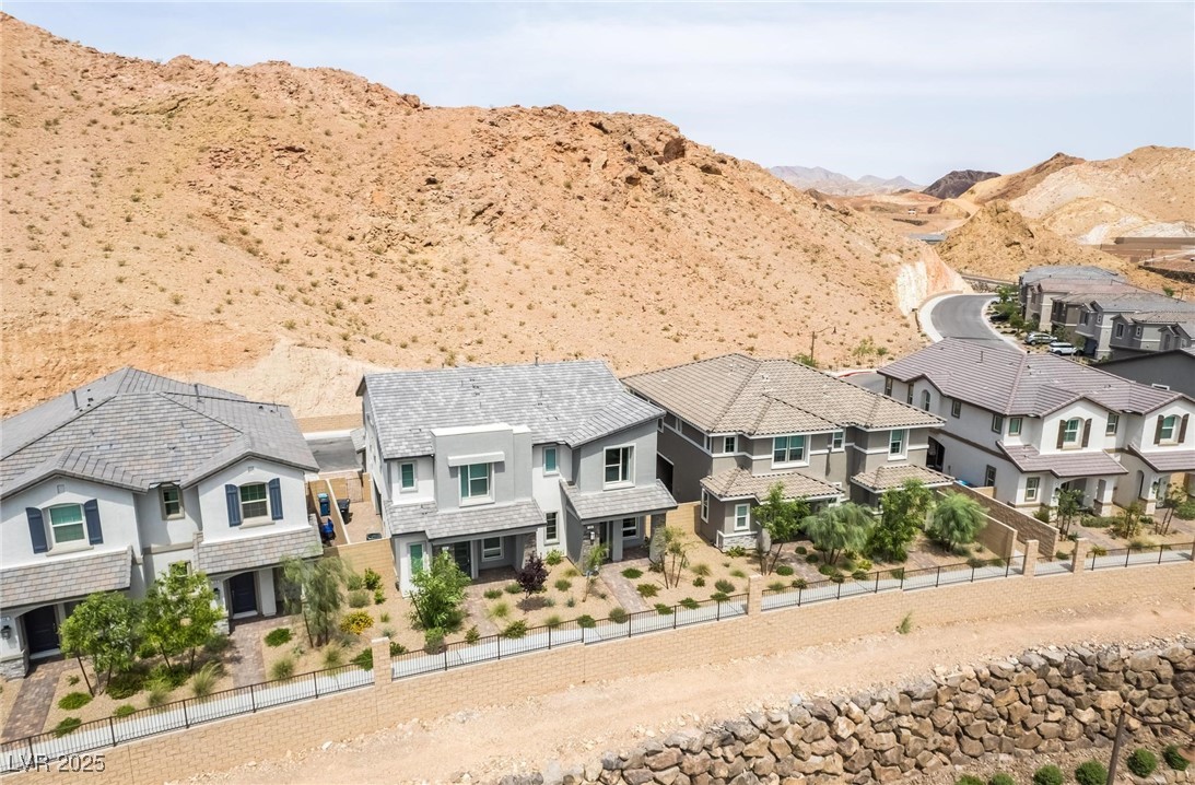 128 Kimberlite Drive Henderson, NV 89011 - Photo 45 of 55 Aerial view of residential area featuring a mountain backdrop