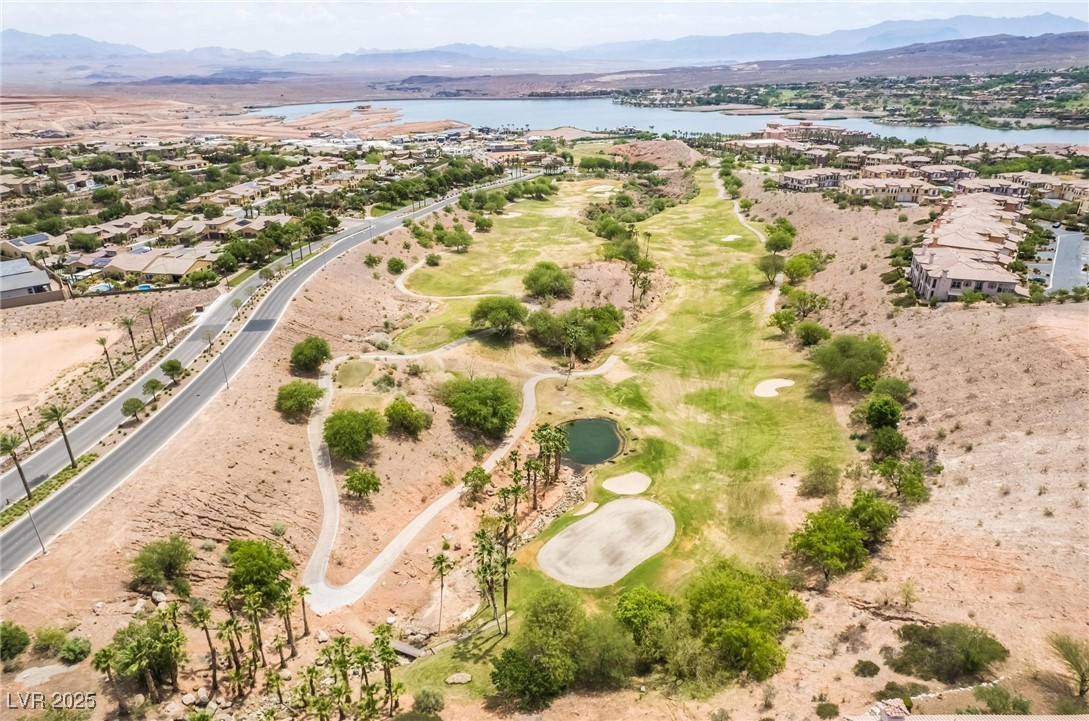 128 Kimberlite Drive Henderson, NV 89011 - Photo 48 of 55 Aerial view of property and surrounding area with a water and mountain view and nearby suburban area