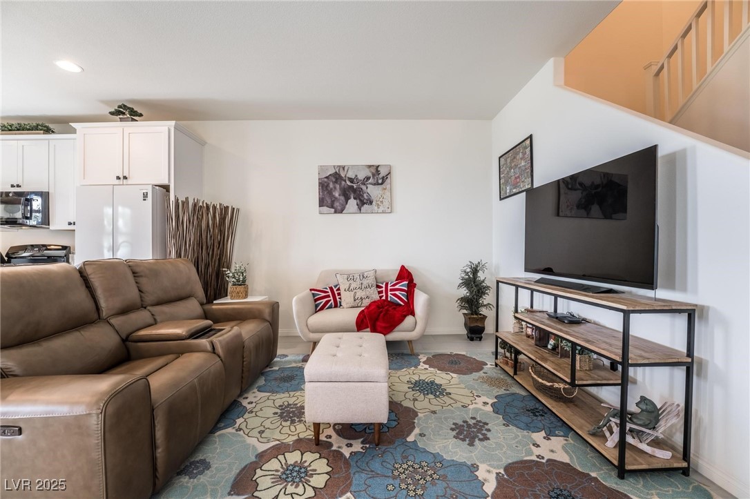 128 Kimberlite Drive Henderson, NV 89011 - Photo 5 of 55 Living area featuring wood finished floors and recessed lighting