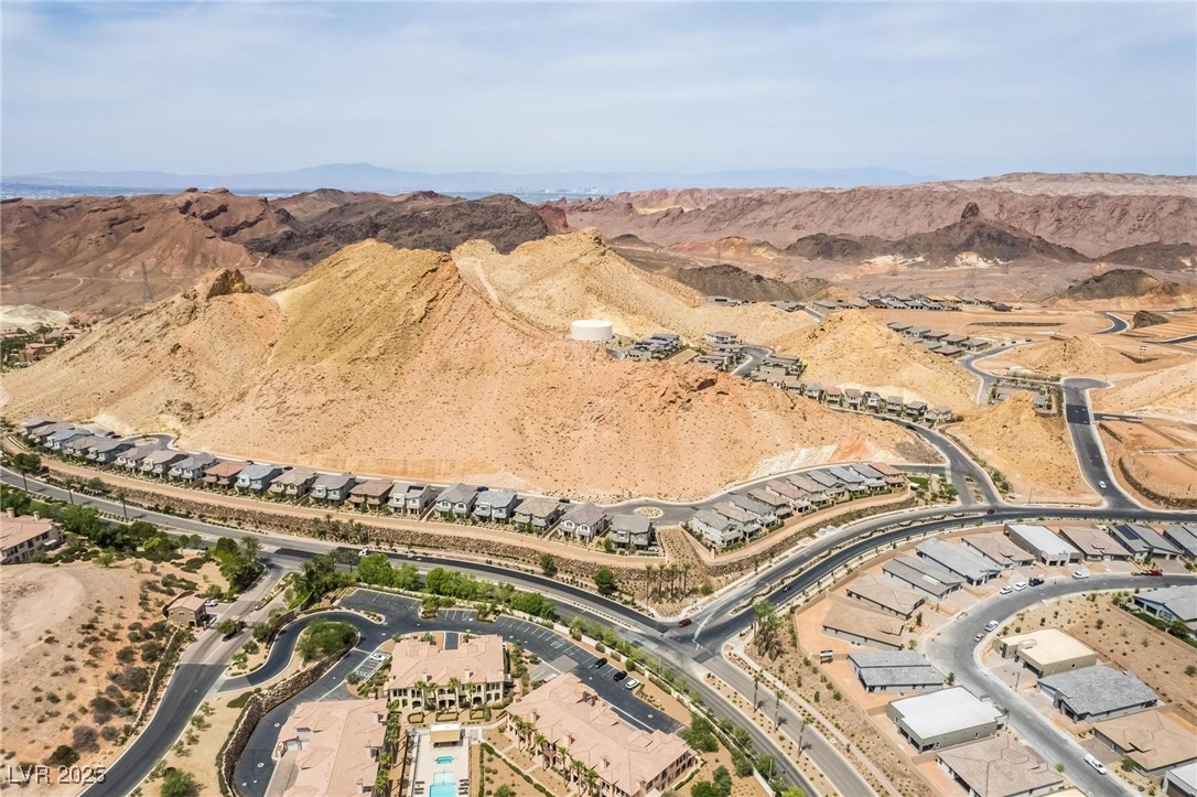 128 Kimberlite Drive Henderson, NV 89011 - Photo 54 of 55 Aerial overview of property's location featuring a mountain backdrop and nearby suburban area